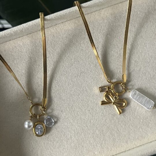 Snake Charm Necklaces